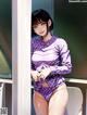 A woman in a purple shirt and panties leaning against a window.